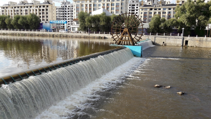 Two-Way Tide Retaining Hydraulic Elevator Dam