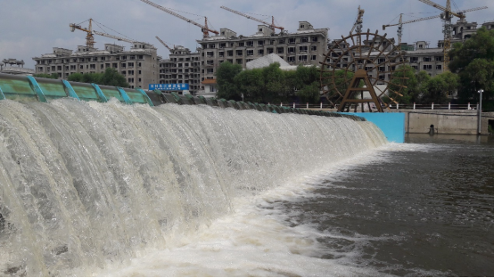 Two-Way Tide Retaining Hydraulic Elevator Dam