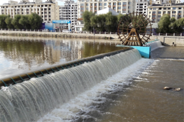 Two-Way Tide Retaining Hydraulic Elevator Dam